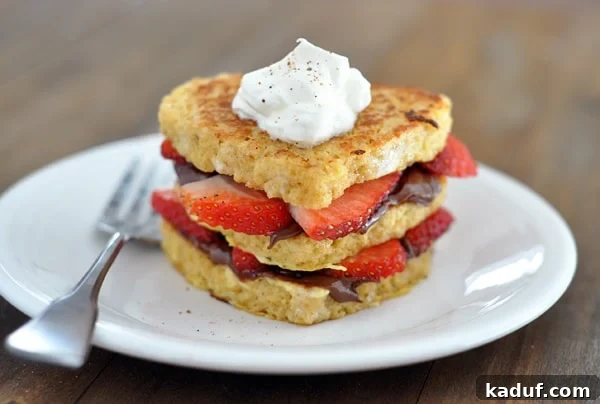Strawberry and Nutella Bliss French Toast 4 Side view of a chocolate and strawberry stuffed french toast.