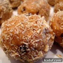 A small stack of Peanut Butter Crunch Snack Balls, ready to be enjoyed.