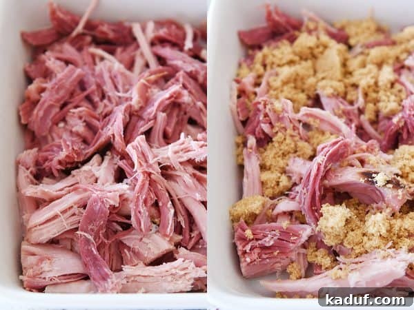 Sweet Glazed Baked Ham 11 Shredded sweet baked ham in white baking dish.