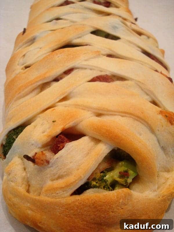 Golden Cheesy Ham and Broccoli Crescent Braid 2 Bread with crisscrossed top filled with broccoli and ham. A beautifully golden Cheesy Ham and Broccoli Crescent Braid, sliced and ready to serve, showcasing its flaky crust and savory filling.