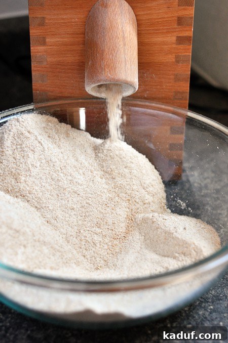 The Ultimate Guide to Wheat Grinders Plus Over 60 Popular Model Reviews 7 a bowl full of freshly ground wheat