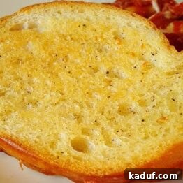 Crispy, buttery garlic bread slices ready to serve.