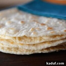 Step-by-Step Guide to Homemade White and Whole Wheat Tortillas 5 A beautifully golden homemade tortilla, ready to be filled or enjoyed plain.