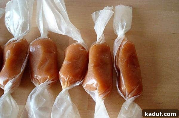 Moms Signature Caramels 2 A row of neatly wrapped homemade caramels, ready for gifting or enjoying.