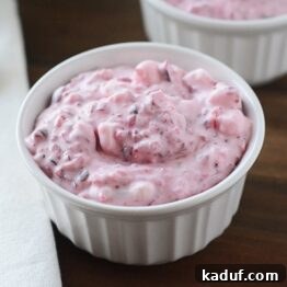 Close-up of cranberry fluff salad in a bowl.