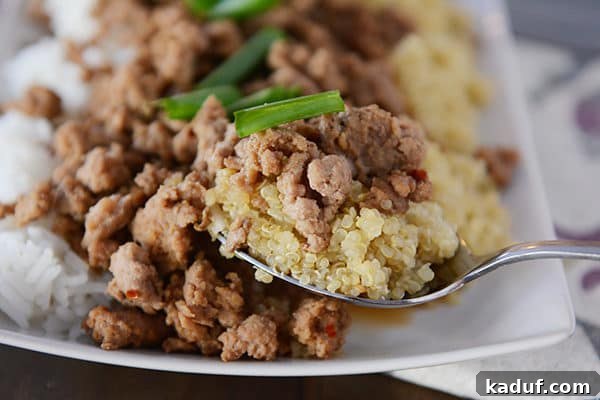 20-Minute Korean Beef and Rice or Quinoa Meal 2 A serving of flavorful Korean beef over a bed of fluffy quinoa, with more delicious beef and perfectly cooked rice in the background.