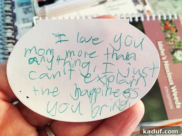 A heartwarming handwritten note from a child expressing encouragement to their mother.