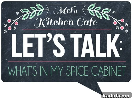 My Spice Cabinet Unveiled 2 A beautifully organized spice rack showcasing a variety of vibrant essential spices.