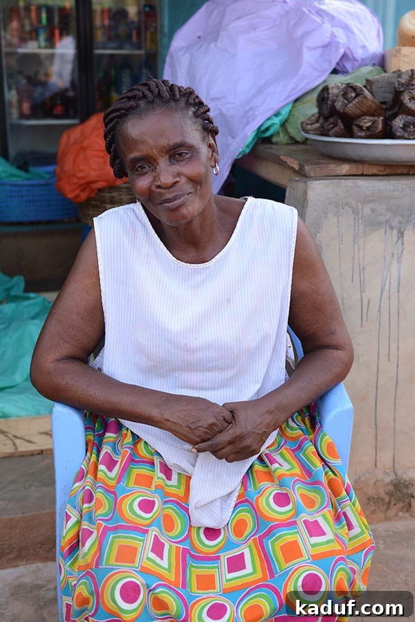 Answering Africa's Call 12 Gladys, a Mentors International client, beaming with joy