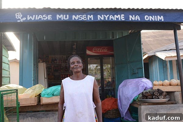 Answering Africa's Call 13 Gladys standing proudly in her bread and drink shop