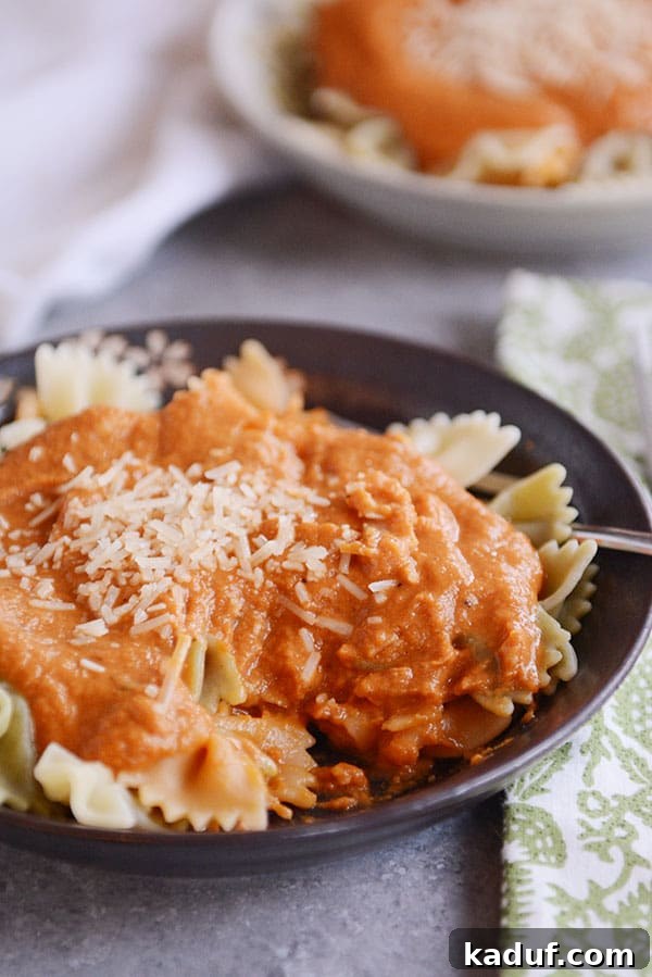 Another close-up view of the delicious harvest pasta sauce with bowtie pasta and parmesan, ready to be served.