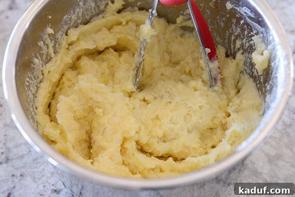Velvety Instant Pot Mashed Potatoes 7 Instant Pot bowl full of mashed potatoes.