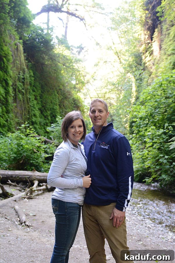 The Laid-Back Guide to Redwood National Forest 20 A man and woman standing in the forest, enjoying the serene atmosphere of Fern Canyon.