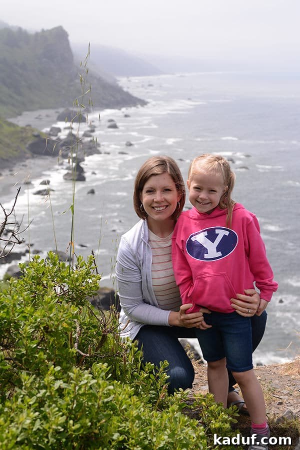 The Laid-Back Guide to Redwood National Forest 23 A Mom and her daughter on the rugged coast, enjoying the ocean view.