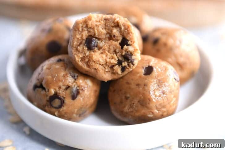 Delicious Protein Bites: Tailored to Your Taste 7 Soft peanut butter chocolate chip balls in a small white dish, with a bite taken out of the top one.