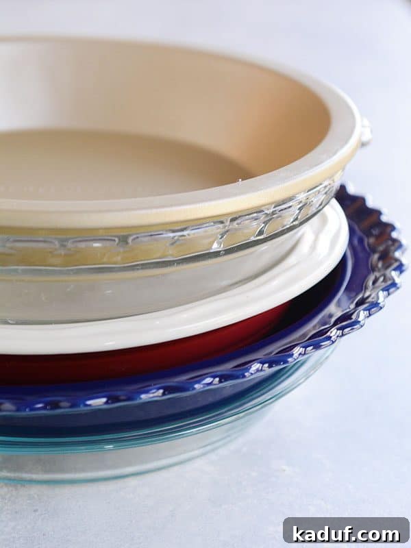 Pie Boot Camp: Gearing Up for Great Pies 7 A stack of various colors and sizes of pie dishes, ready for baking.