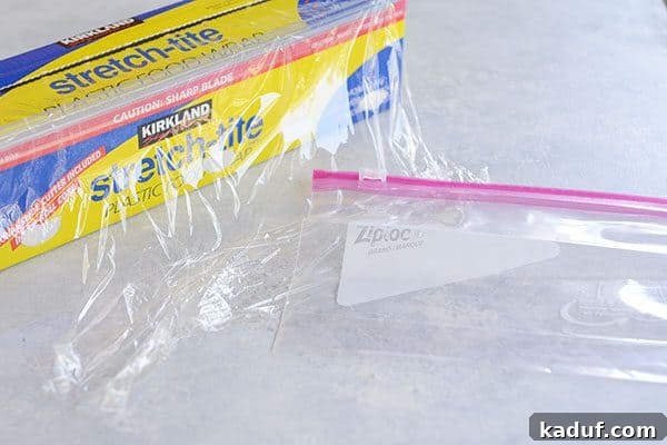 Pie Boot Camp: Gearing Up for Great Pies 9 Saran wrap and a Ziploc bag on a white countertop, showing useful items for storing pie crust.