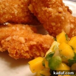 Close-up of the macadamia-crusted chicken and mango salsa meal.