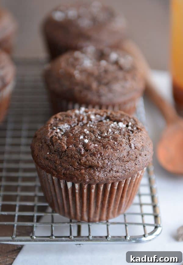 A final inviting shot of double chocolate salted caramel muffins cooling, ready to be enjoyed.
