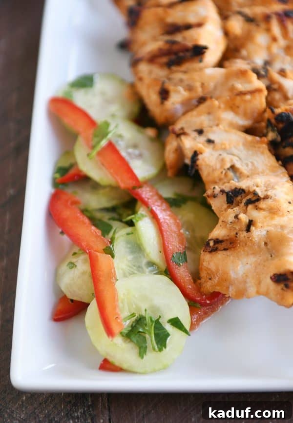 Creamy Almond Coconut Chicken Satay 3 Platter with Almond Coconut Milk Chicken Satay and Quick Cucumber Salad.