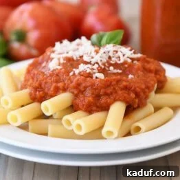 Homemade canned spaghetti sauce recipe with penne pasta.