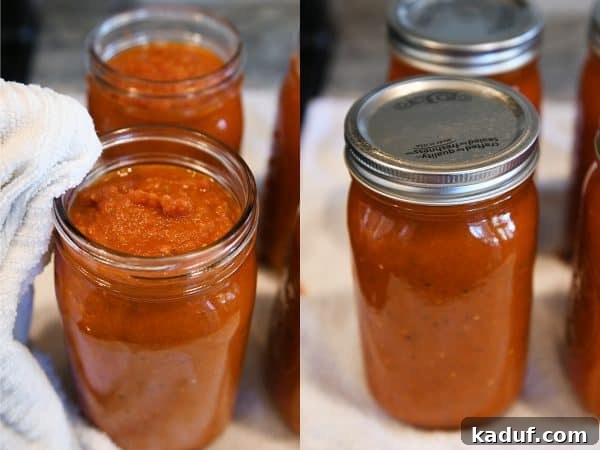 DIY Homemade Canned Spaghetti Sauce Step by Step 10 Wiping edge of jar and putting on lids and rings for homemade canned spaghetti sauce recipe.