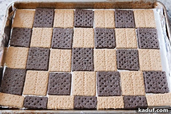 Peanut Butter Chocolate Graham Cracker Bark 4 A tray of perfectly arranged graham crackers, ready for the delicious toffee topping.