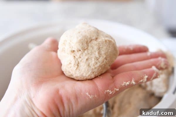Mastering Yeast Baking: Modern Techniques 10 Rolling ball of dough in hand