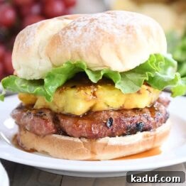 Tropical Teriyaki Turkey Burgers with Grilled Pineapple 8 Teriyaki Turkey Burgers with grilled pineapple, fresh lettuce, and a soft hamburger bun.