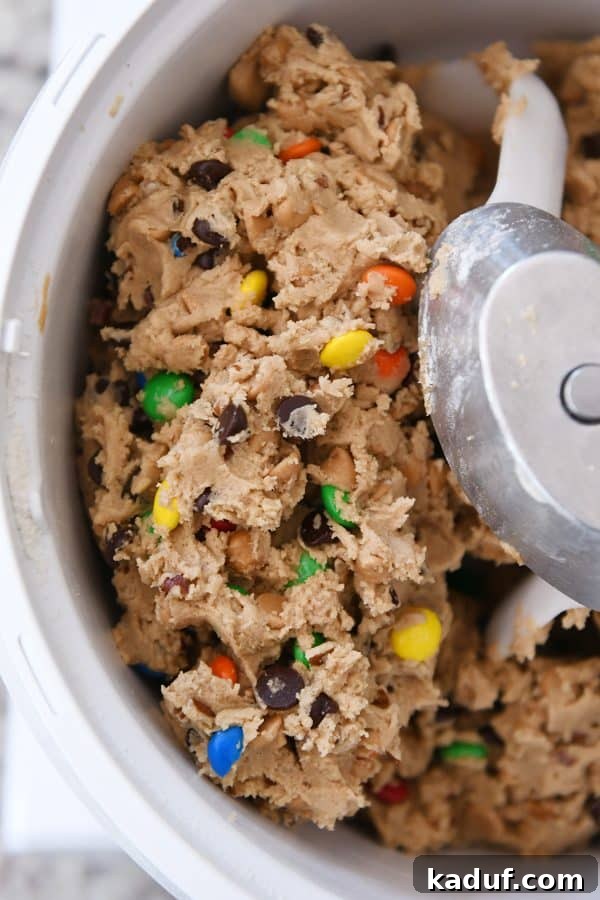 Peanut Butter Cosmic Crunch Cookies 6 Mixed peanut butter kitchen sink cookie dough in Bosch mixer.