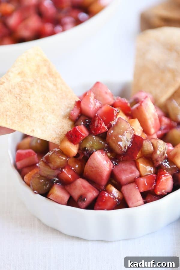 Vibrant Fruit Salsa with Honey-Kissed Cinnamon Crisps 3 Small white bowl with fruit salsa with baked cinnamon tortilla chips.