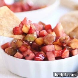 Vibrant Fruit Salsa with Honey-Kissed Cinnamon Crisps 8 Small white bowl with fruit salsa with baked cinnamon tortilla chips.