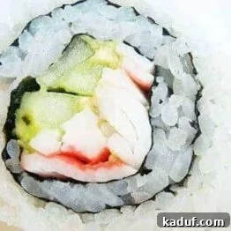 Side view of a California sushi roll, presented as a recipe image.