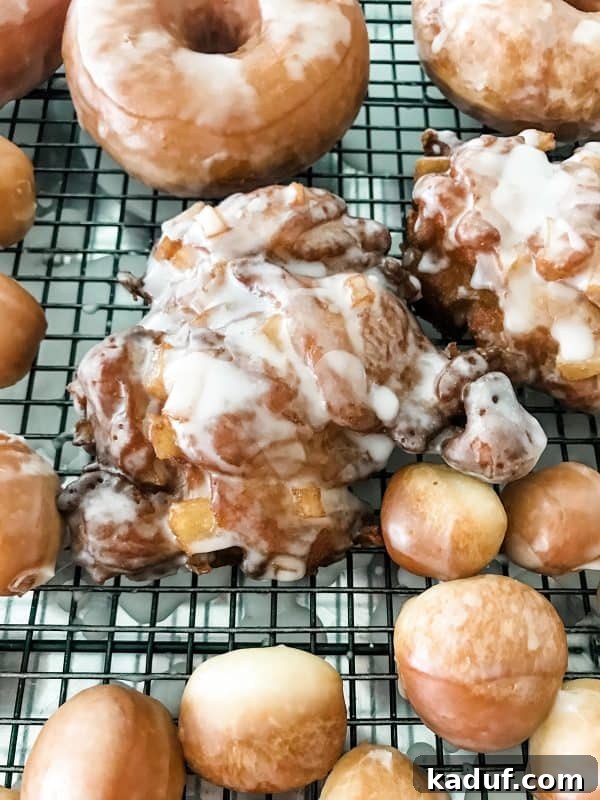 Melt-in-Your-Mouth Homemade Glazed Donuts 17 Homemade apple fritters made from donut scraps, golden brown and glazed.