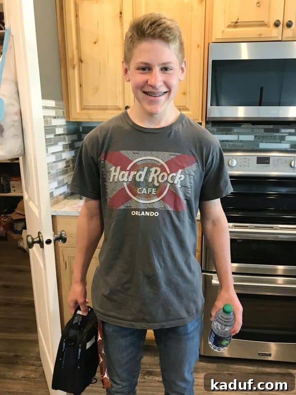 Weekly Wind Down 7 teenager with lunch and water bottle