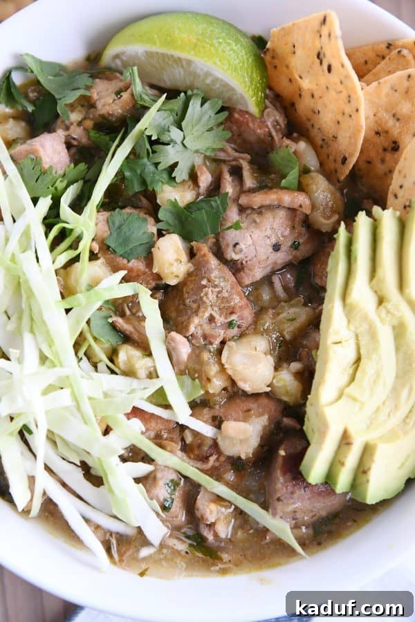 Easy Slow Cooker Posole 8 Pork, hominy, cilantro, avocado, cabbage.