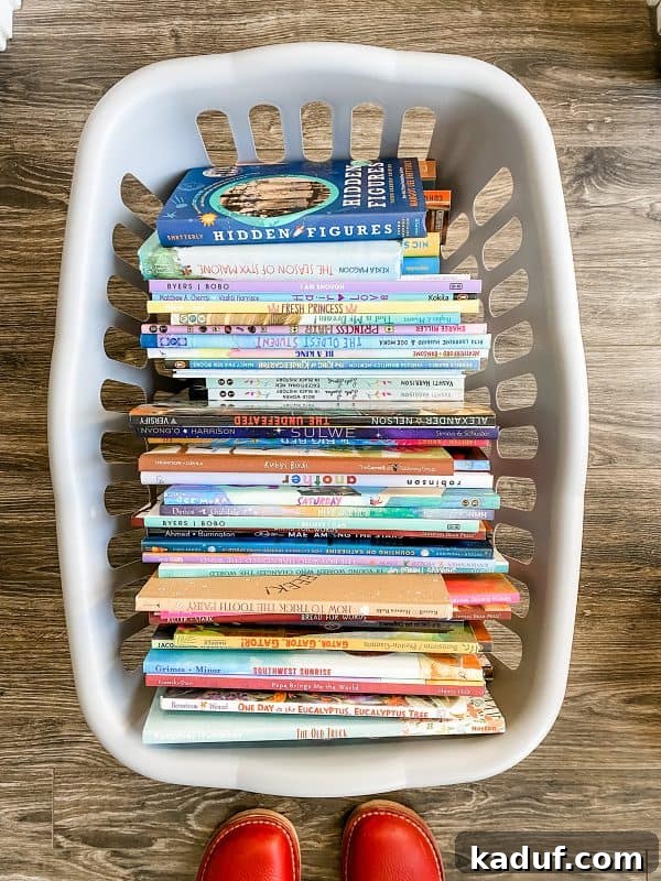 Friday Musings 3 a gray basket overflowing with a diverse collection of children's books