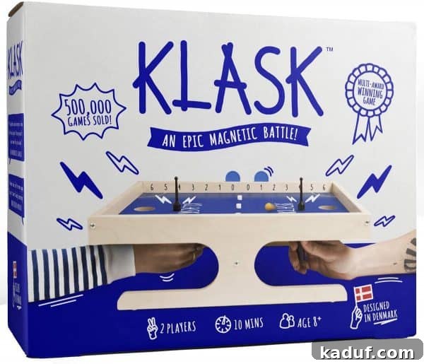 Friday Musings 4 the Klask game board with magnetic players and ball ready for play