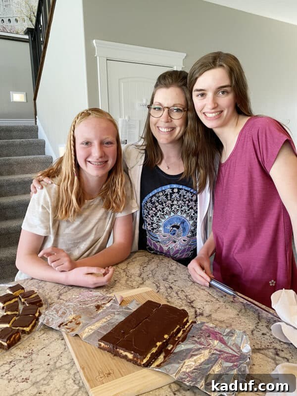 Friday Reflections: Life Lately and Finding My Rhythm 5 Three women stand together in front of a pan of freshly made Nanaimo bars, a shared moment of baking in honor of a dear friend.