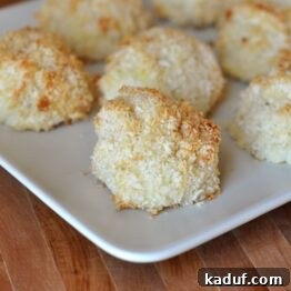 A small golden potato puff, showcasing its crispy exterior and appealing texture.