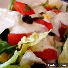 Vibrant Creamy Cilantro Lime Dressing 3 A jar of freshly made creamy cilantro lime salad dressing.
