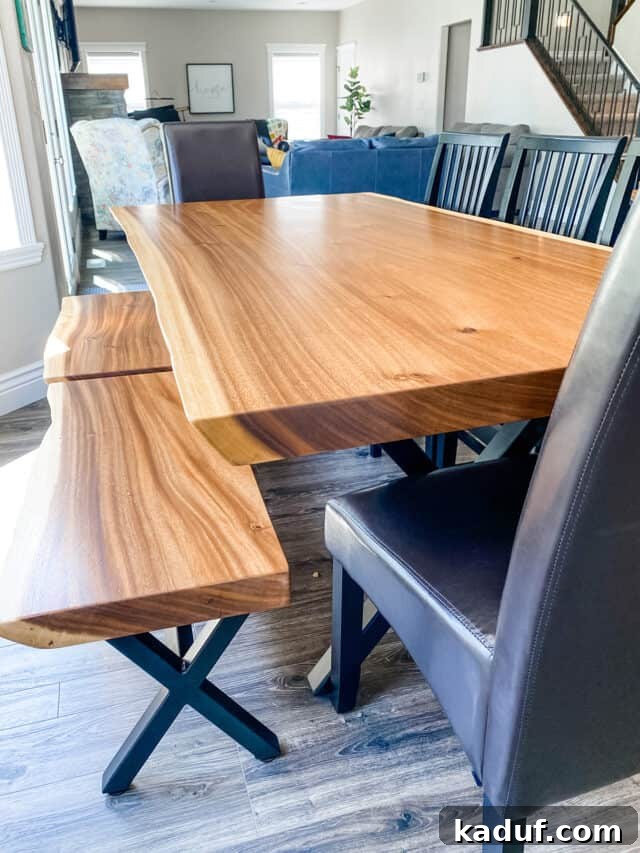 Warp-Speed Friday Wisdom 2 Stunning custom kitchen table crafted from a monkey pod wood slab, featuring natural wood grain and matching benches.