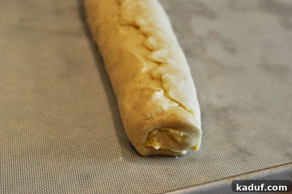 Orange Glazed Sweet Rolls 7 Bread dough rolled into a log.