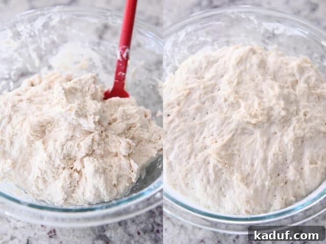 Pratik Yoğurmasız Köy Ekmeği 6 A rubber spatula is used to gently mix the wet dough in a glass bowl, demonstrating the initial combination of ingredients for no-knead peasant bread.