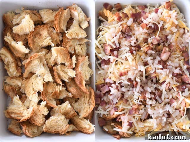 Overnight Cheesy Bacon Croissant Strata 4 Layers of torn toasted croissants, crispy bacon, sautéed onions, and generous shredded cheese in a white 9X13-inch baking dish, ready for the custard.