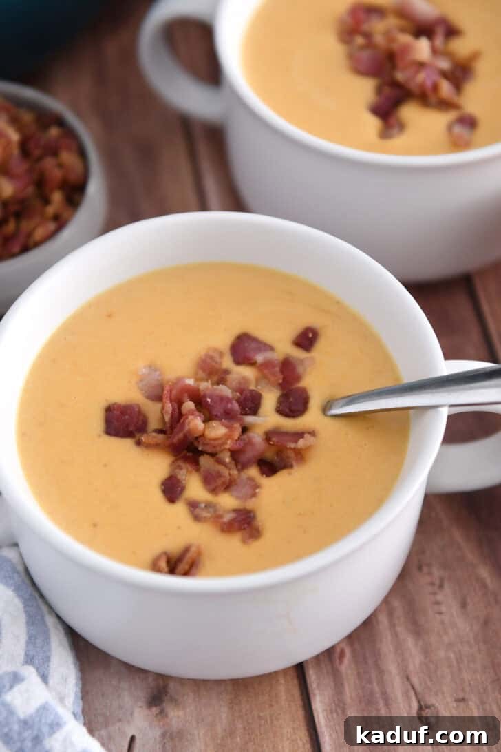 The Ultimate Butternut Squash Soup Experience 8 Bowls of butternut squash soup topped with bacon.