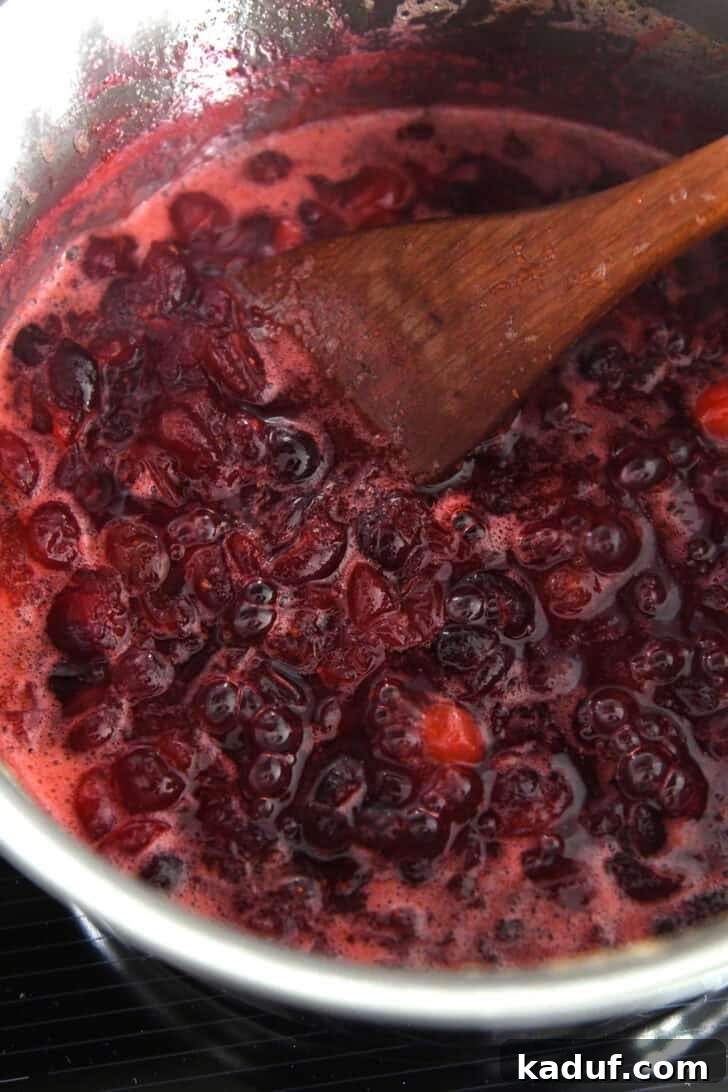 Divine Cranberry Citrus Angel Food Cake 3 Cranberry Orange Filling Simmering