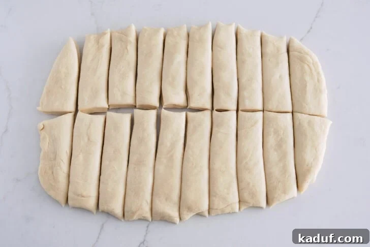Fluffy Cinnamon Sugar Knots 4 Dough pressed into thick rectangle and cut into 20 strips. Easy Fluffy Cinnamon Sugar Twists
