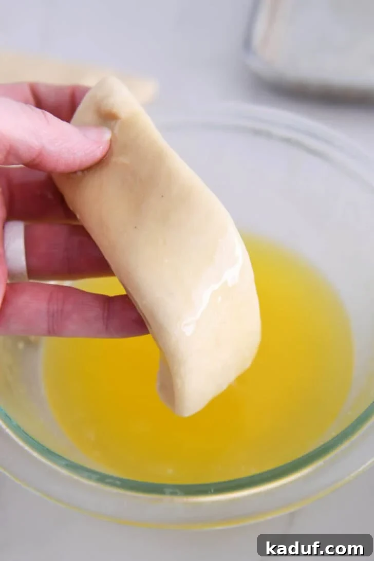 Fluffy Cinnamon Sugar Knots 5 Piece of dough dipped in melted butter. Easy Fluffy Cinnamon Sugar Twists