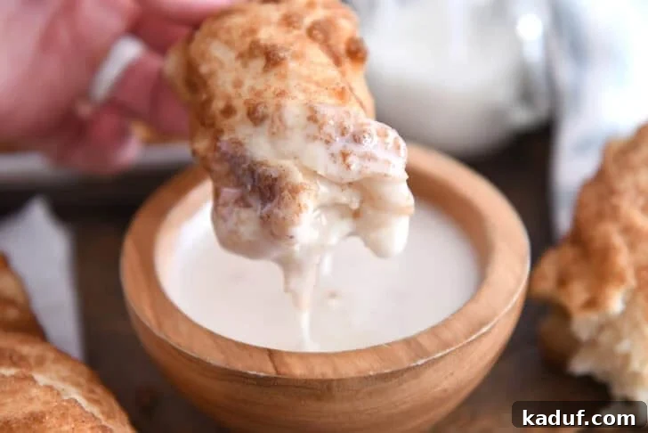 Fluffy Cinnamon Sugar Knots 10 Dipping cinnamon sugar twist in bowl of sweet icing. These buttery cinnamon sugar twists are unbelievably delicious. Easier than cinnamon rolls, they are soft, fluffy and delicious plain or with a bit of sweet icing!